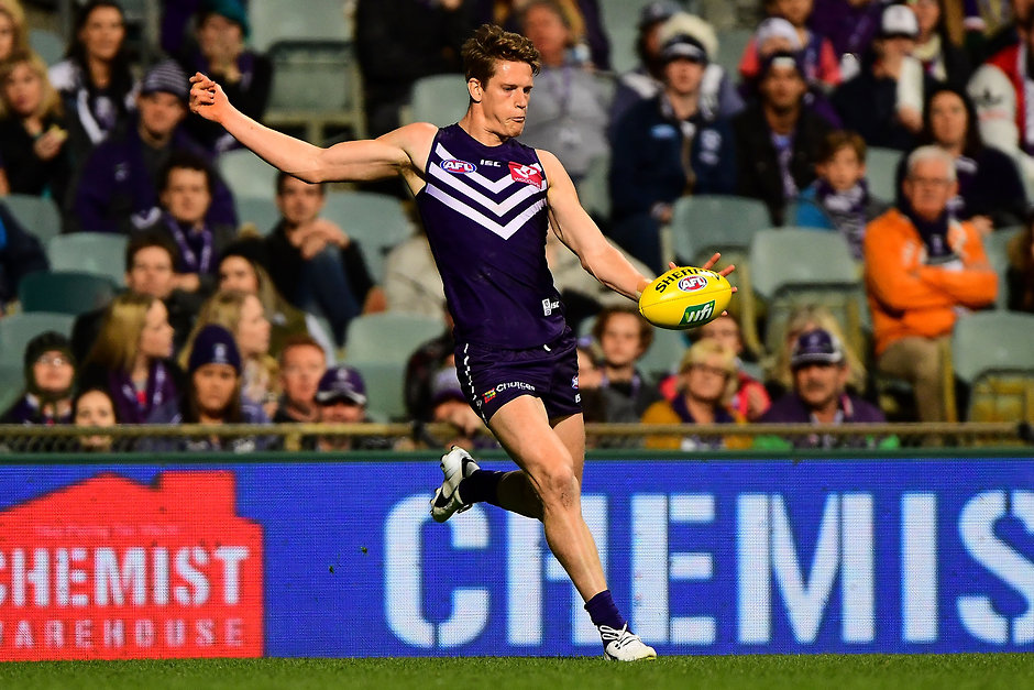 AFL 2016 Rd 17 - Fremantle v Geelong PERTH, AUSTRALIA - JULY 15: Matt Taberner of the Dockers kicks on goal during the 2016 AFL Round 17 match between the Fremantle Dockers and the Geelong Cats at Domain Stadium on July 15, 2016 in Perth, Australia. (Photo by Daniel Carson/AFL Media)